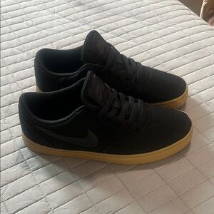Nike Black and Gold Sneakers